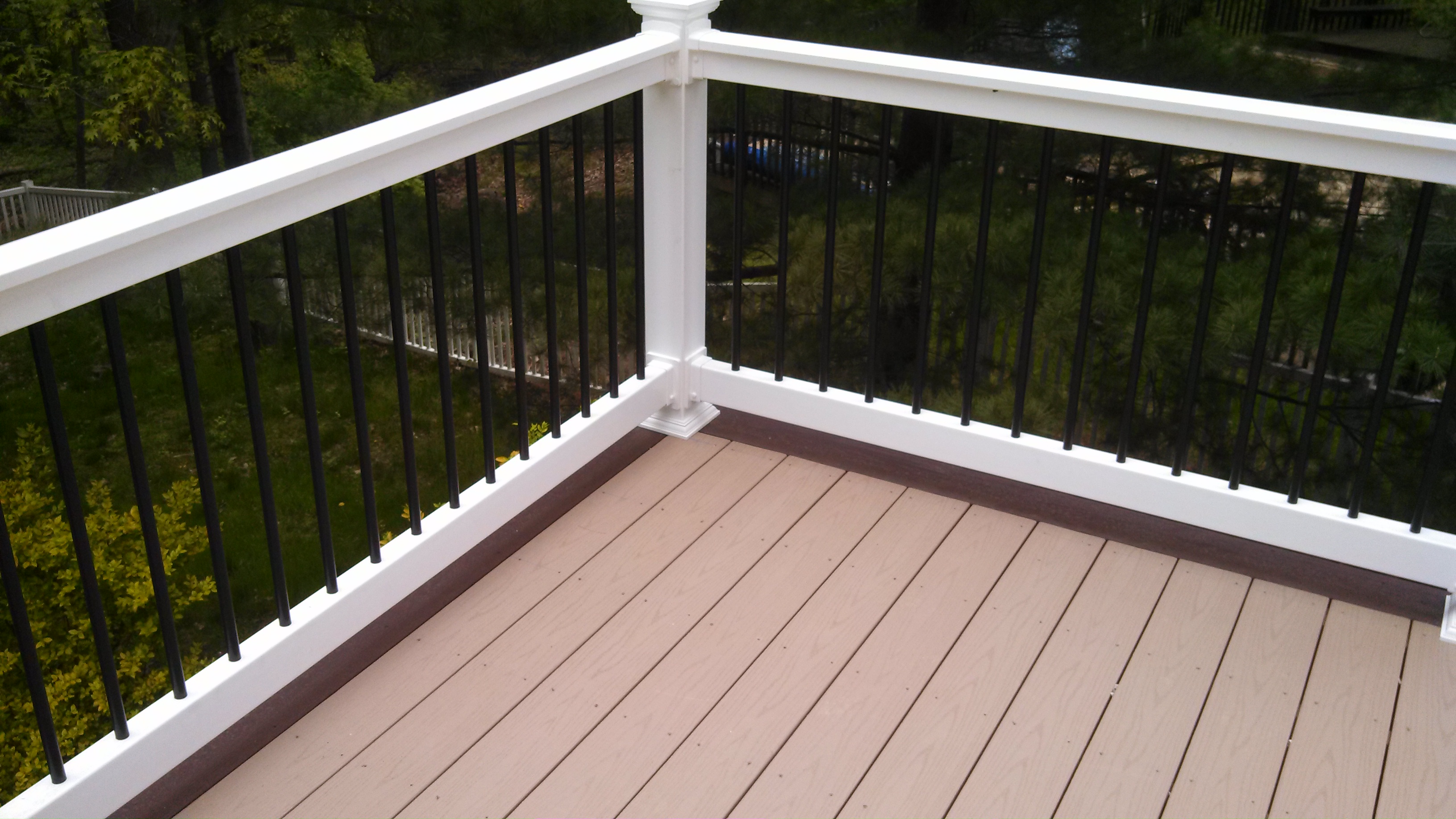 Low-Maintenance  Azek & vinyl Deck with aluminum balusters built by Buckstone Builders in Stow, Summit County Northeast Ohio